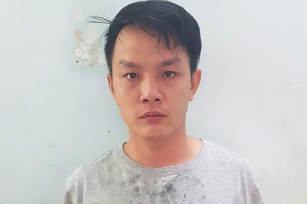 Nghi can thứ 3 vụ dùng súng cướp ngân hàng ở TP.HCM ra đầu thú-1