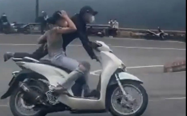 Khởi tố cặp vợ chồng làm xiếc trên đèo Hải Vân-1