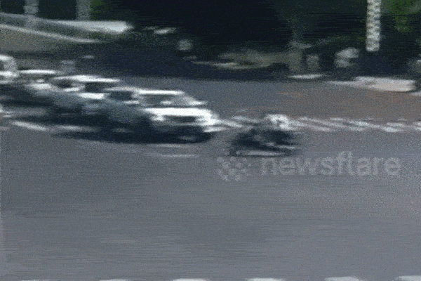 Clip: Vượt đèn đỏ, nam thanh niên bị ô tô tông lộn 2 vòng trên không