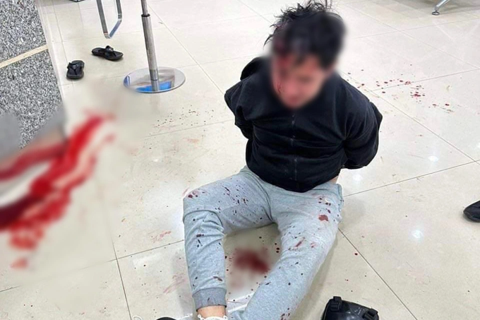 Tên cướp ngân hàng ở Bình Dương: Chị không đưa tiền là chị chết-1