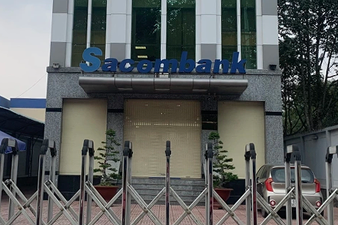 Tên cướp ngân hàng ở Bình Dương: Chị không đưa tiền là chị chết-2