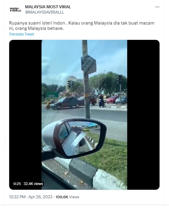 Vợ chặn đầu xe trong khi chồng vẫn cố lái, lý do được tiết lộ khiến MXH tranh cãi không ngớt-1