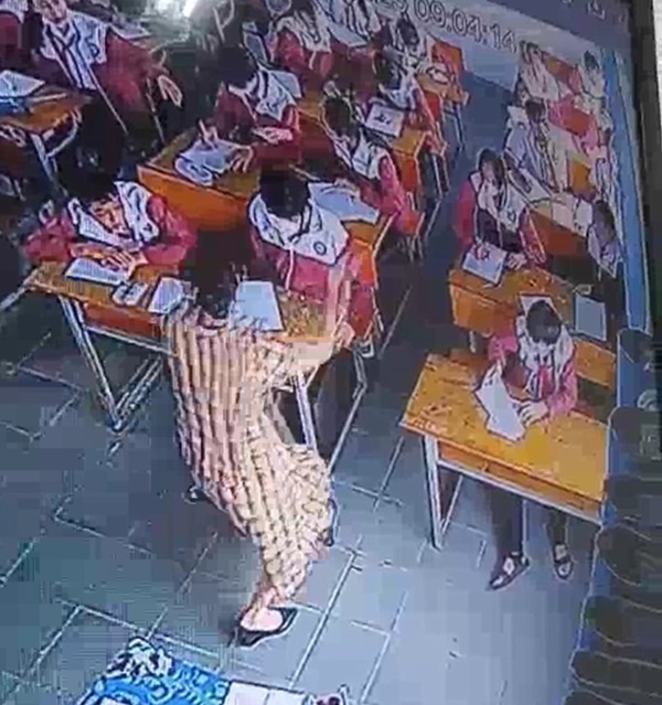 Tát học sinh trong giờ kiểm tra nhưng cô giáo không thừa nhận?-1