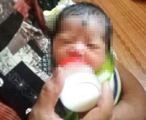 Bé gái khoảng 1 tháng tuổi bị bỏ rơi trong sán chùa cùng lời nhắn-1