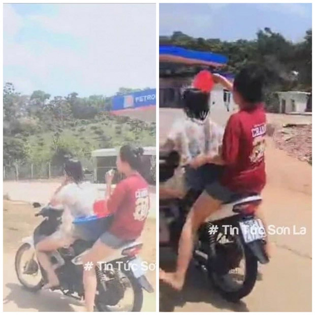Hai nữ sinh ở Sơn La vừa lái xe vừa tắm” cho nhau bị phạt-2