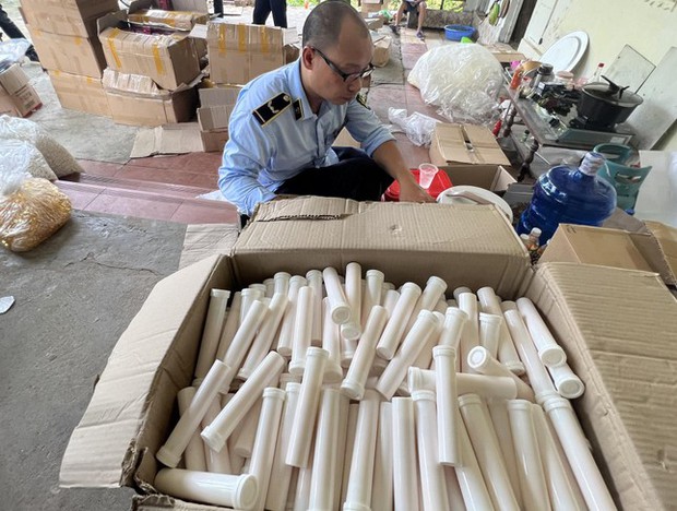 Phát hiện cơ sở sản xuất thực phẩm chức năng khủng nghi giả tại Hà Nội-1