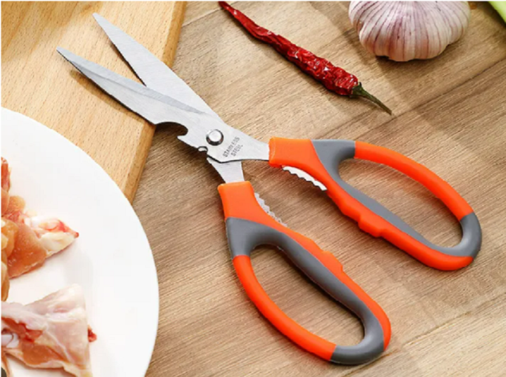 Lỗ khuyết, lỗ răng cưa trên kéo dùng để làm gì?-2