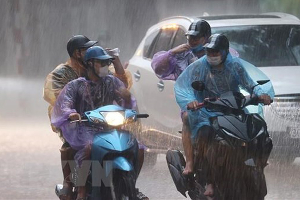 Thời tiết Hà Nội 3 ngày tới: Sắp có mưa lớn, mức nhiệt hạ đến 5 độ-1