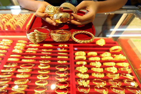 Giá vàng hôm nay 2/7: Áp lực từ USD, vàng khó tăng mạnh-2