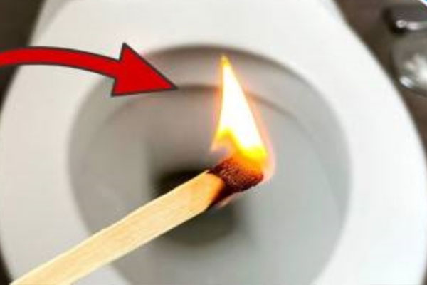 What is the effect of dropping a match into the toilet bowl? -1