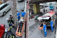 Cảnh sát dùng thang dây cứu thanh niên rơi từ mặt cầu Chương Dương xuống đất