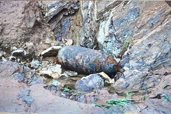 Quả bom hơn 300 kg bất ngờ phát lộ sau mưa lũ ở Yên Bái-1