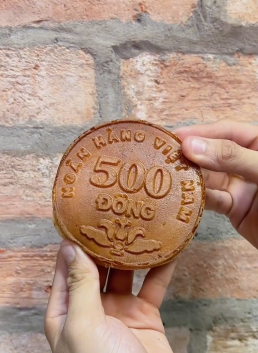 Bánh đồng xu phô mai in hình 500 đồng Việt Nam có vi phạm pháp luật?-2