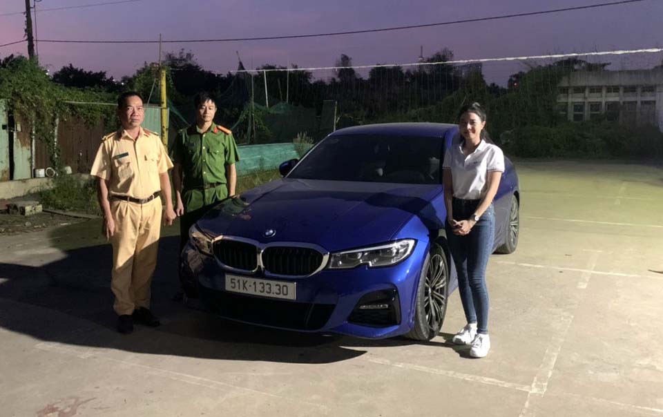 Tạm giữ ôtô BMW trong vụ cô gái lái xe tốc độ 140 km/h ở TP.HCM-1