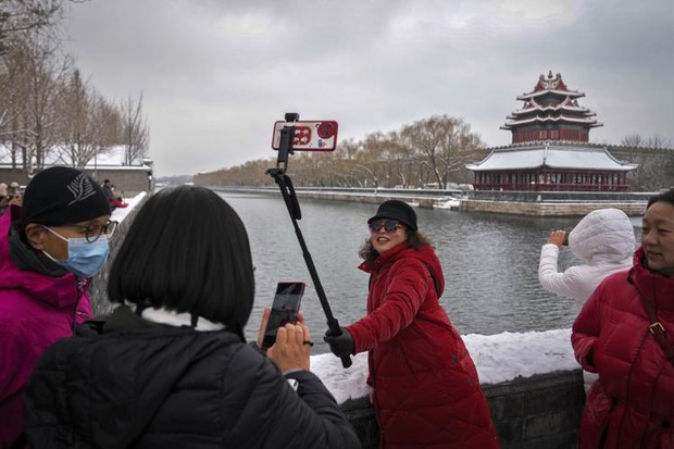 Trung Quốc: Tuyết đầu mùa bao phủ tạo nên cảnh tượng đẹp đến nao lòng tại Tử Cấm Thành-12