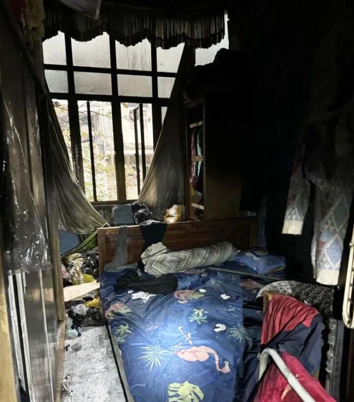 Cháy nhà 4 người chết ở Hà Nội: Nạn nhân duy nhất sống sót nhờ trèo qua ban công-1