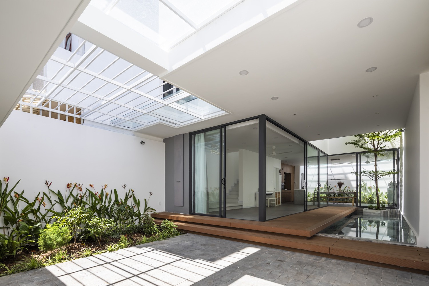 Nhà phố 2 tầng mộc mạc, thiết kế lấy cảm hứng từ một món bánh quê quen thuộc-4