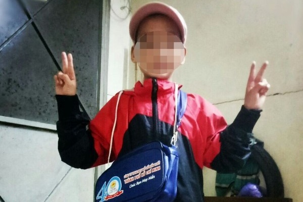 Tìm thấy bé trai bán vé số mất tích 13 ngày ở TPHCM-1