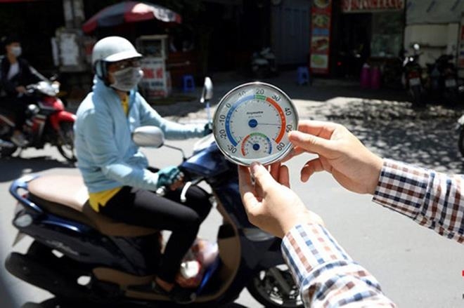 Miền Bắc nắng nóng oi bức đỉnh điểm, Hà Nội có nơi trên 39 độ-1