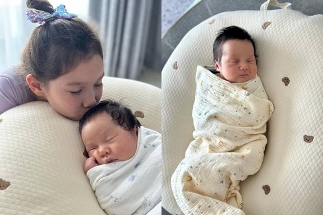 Siêu mẫu Hà Anh chặt chém ngày nào giờ người và áo toàn mùi sữa trớ, khoe con trai lai có nụ cười lãng tử-2