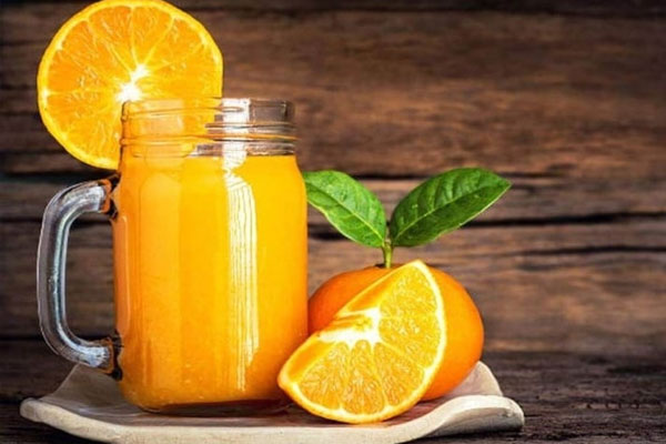 Người bị bệnh này không nên uống nước cam-2
