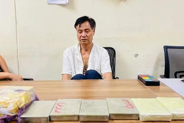 Bắt đối tượng đi xe máy chở 52kg ma túy lấy 200 triệu tiền công-3