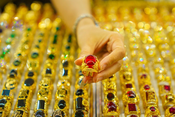 Giá vàng, USD đồng loạt giảm-2