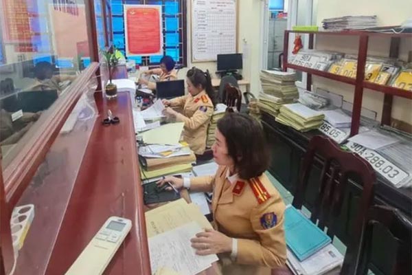 Từ ngày mai, kết thúc hoạt động của 694 cơ quan công an cấp huyện-2